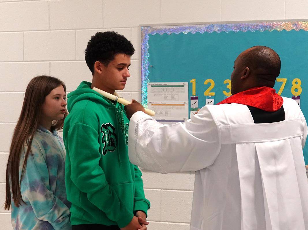. Father Yumo then went to the school to give the blessing to St. Mark Catholic School students.