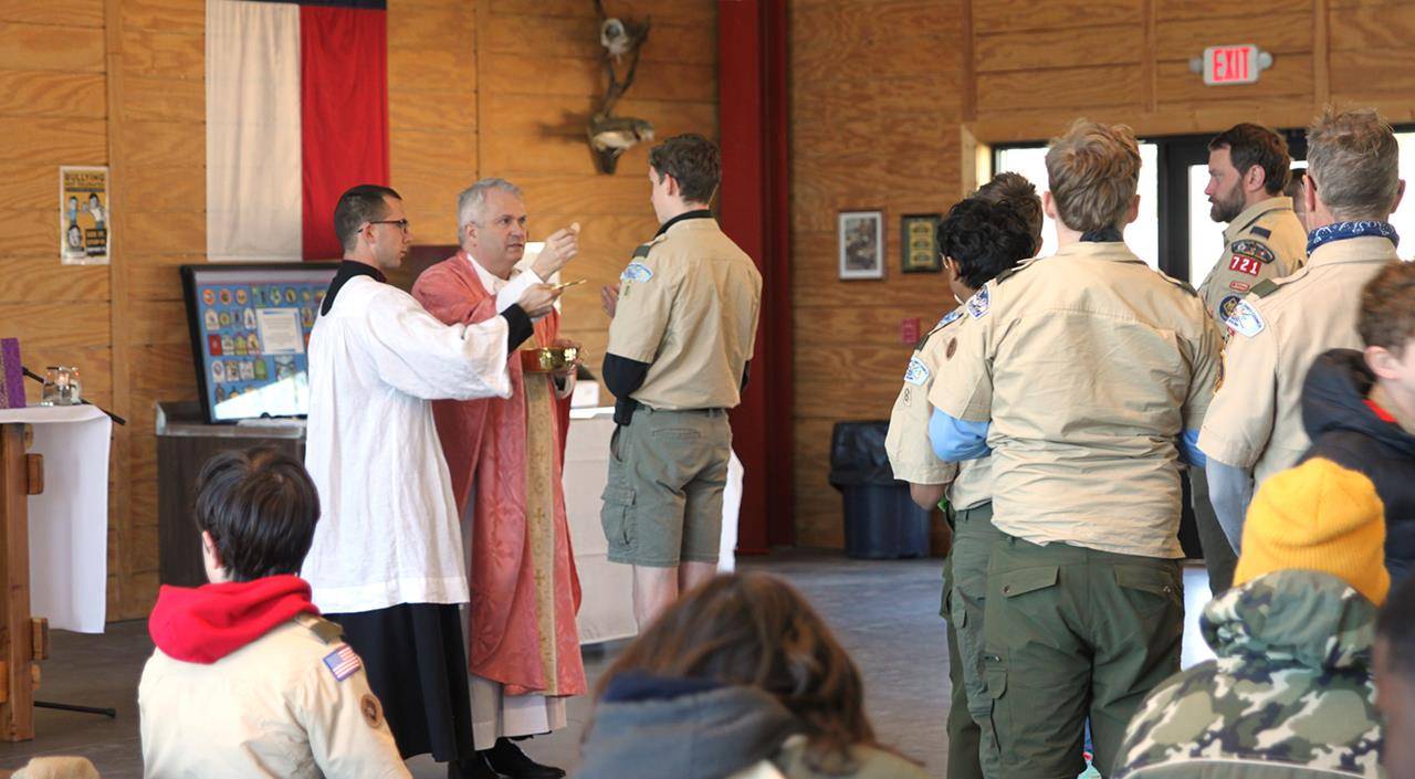 Catholic Scouts and their families consider the closing Mass a highlight of the annual Catholic Camporee. (Photo by Patricia Guilfoyle)