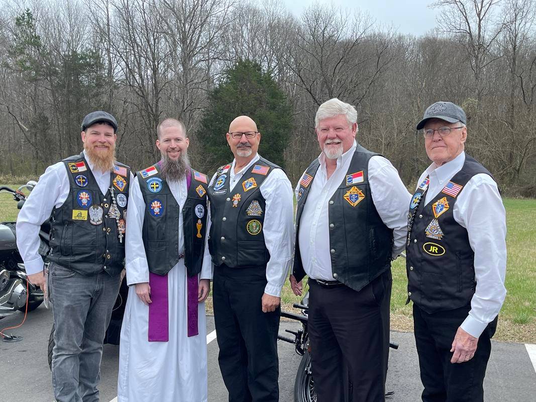 Fr Miller w KofC bikers after install 2023 (Copy)