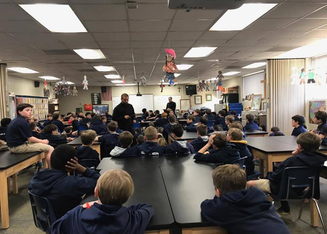 Holy Trinity Middle School had special visitors during Catholic Schools Week. Father Jason Barone and Father Joseph Matlak along with women religious speak to our students about vocations. (Photo via Facebook)