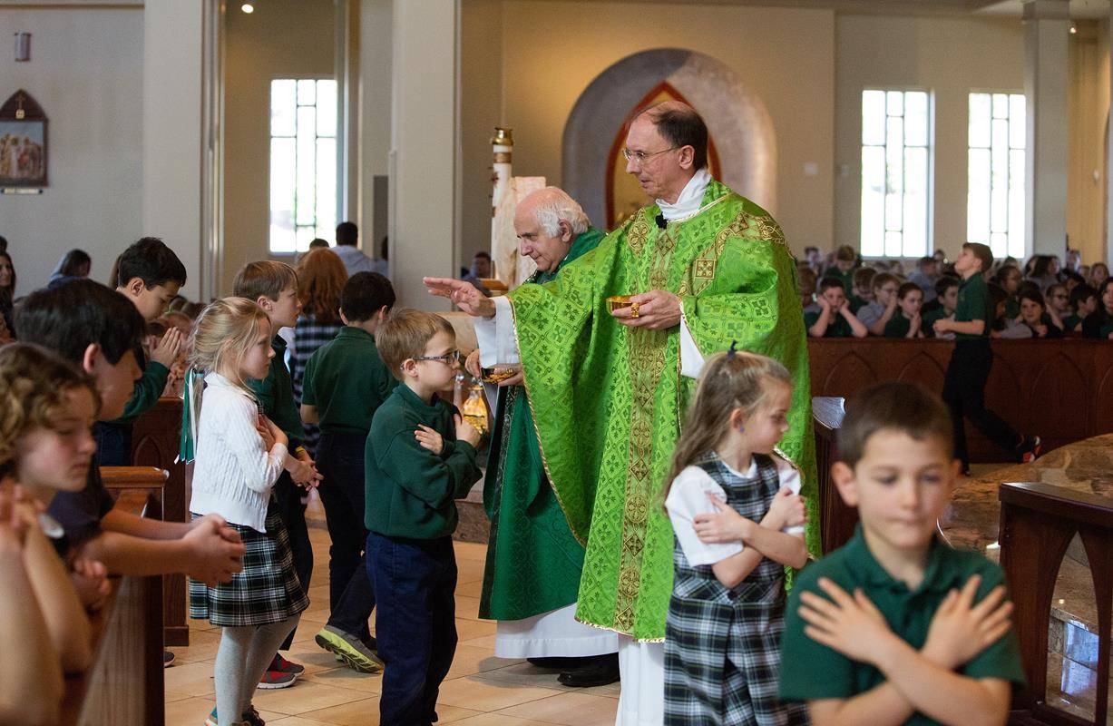 St. Mark students in Huntersville kicked off Catholic Schools Week with a Mass with Bishop Peter Jugis. (Photos by Jeannie DeSena) 