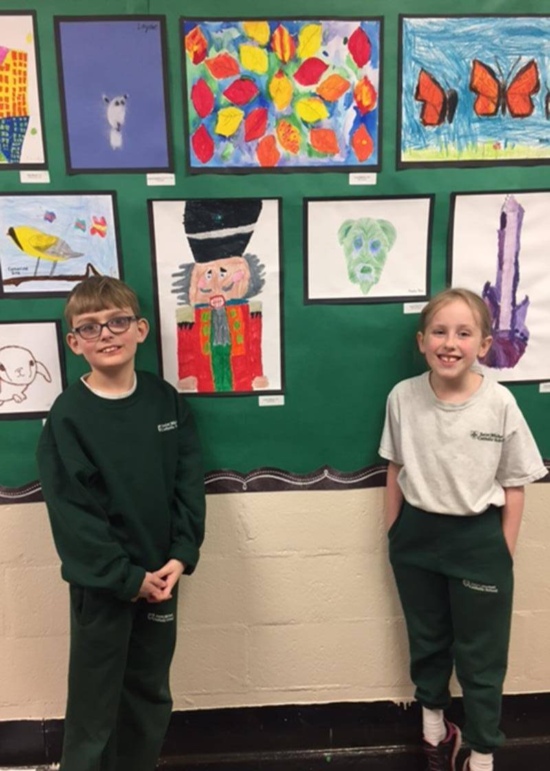 St. Michael Catholic School wrapped up Catholic Schools Week with a Grandparents’ Day event. Pic-tured are Carson Weaver and Lucy Peterson. (Photo submitted by Emma Hughlett)