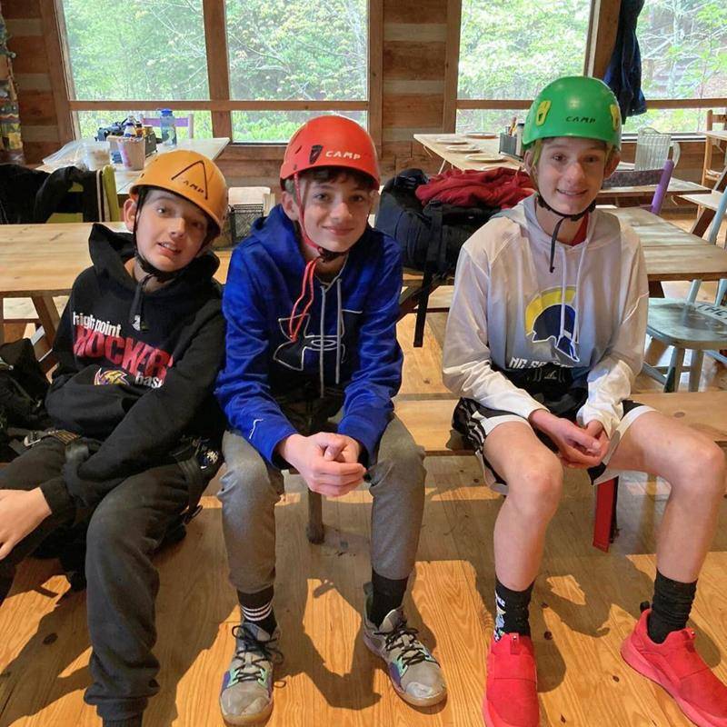 The students prepared for the ropes course.