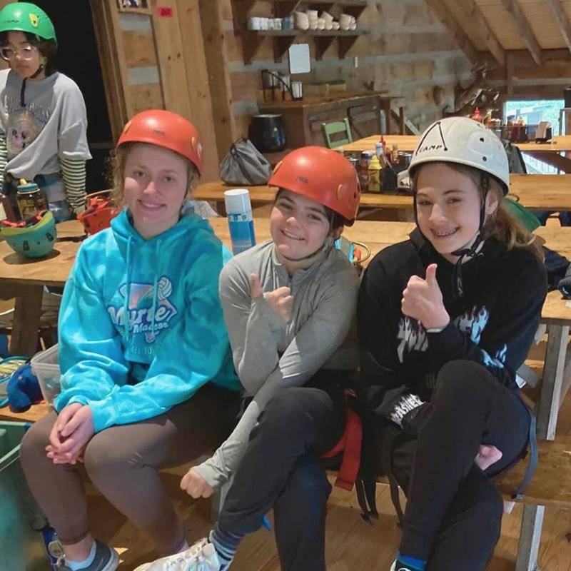 The seventh-grade girls are ready for the ropes course too.