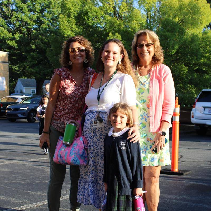 Students, faculty and parents smile for the first day of school at St. Leo School.