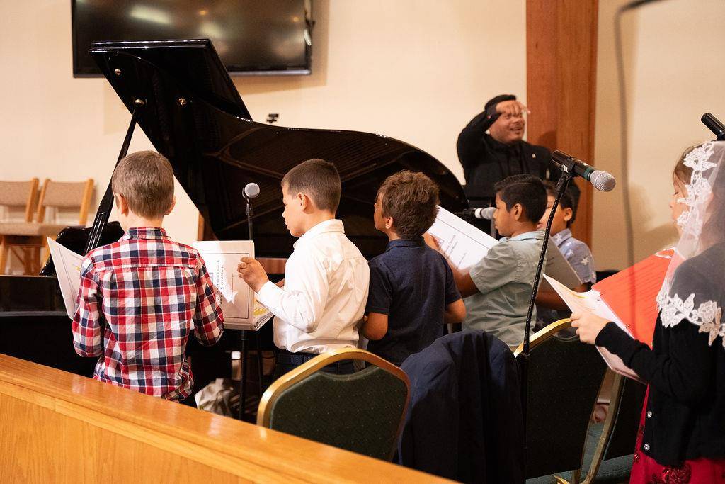 The children's choir sang during the anniversary Mass.
