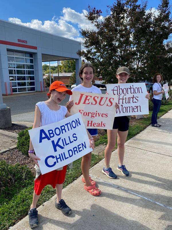 Faithful gathered along Battleground Avenue in Greensboro on Oct. 1 to pray for life. (Photos provided by David Foppe)