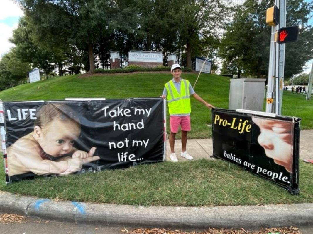 Faithful gathered Oct. 1 in front of the church for a prayer before lining up along Ballantyne Parkway in south Charlotte to pray for life. (Provided photos)