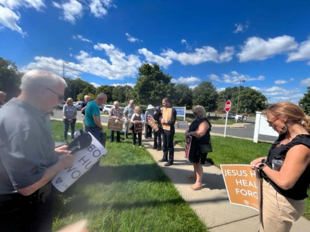 Faithful gathered Oct. 1 in front of the church for a prayer before lining up along Ballantyne Parkway in south Charlotte to pray for life. (Provided photos)
