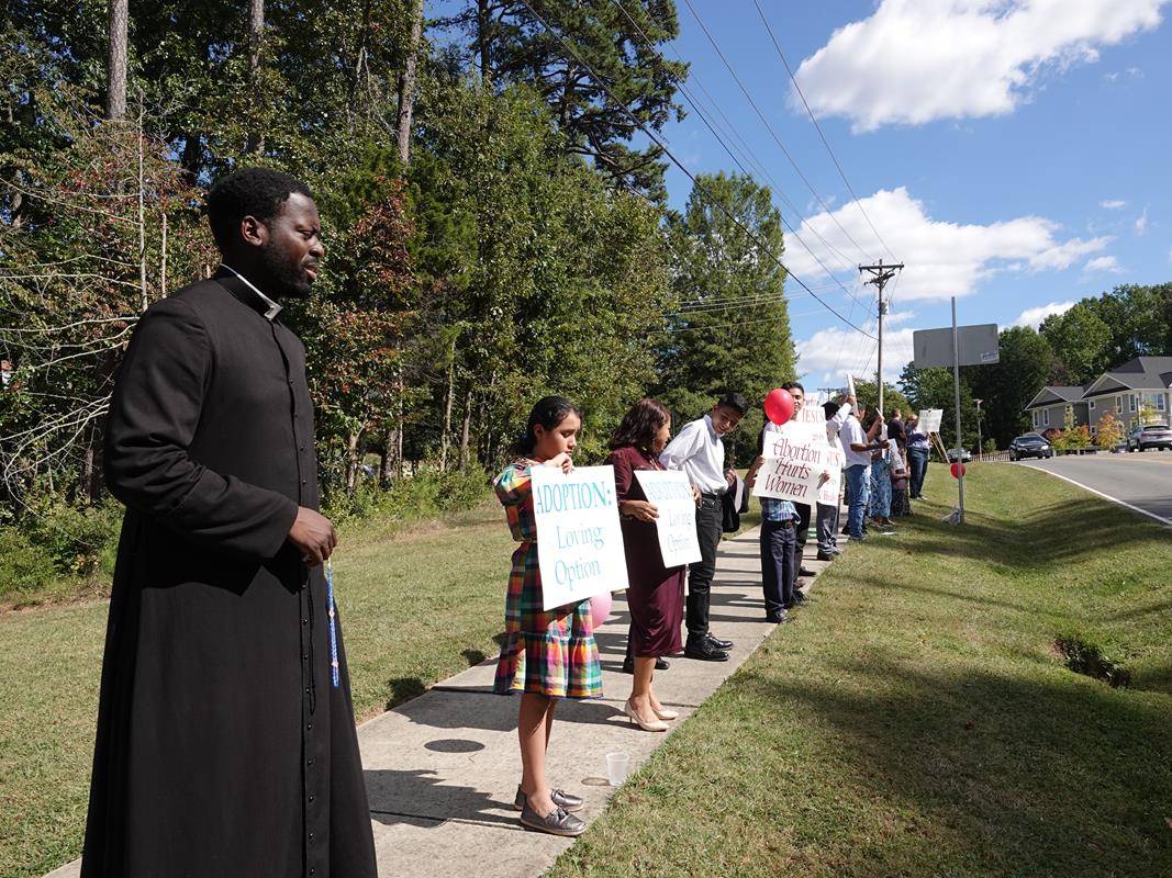 Around 175 people gathered outside St. Mark Church in Huntersville on Oct. 1, to join in the annual Life Chain. (Photos by Amy Burger)