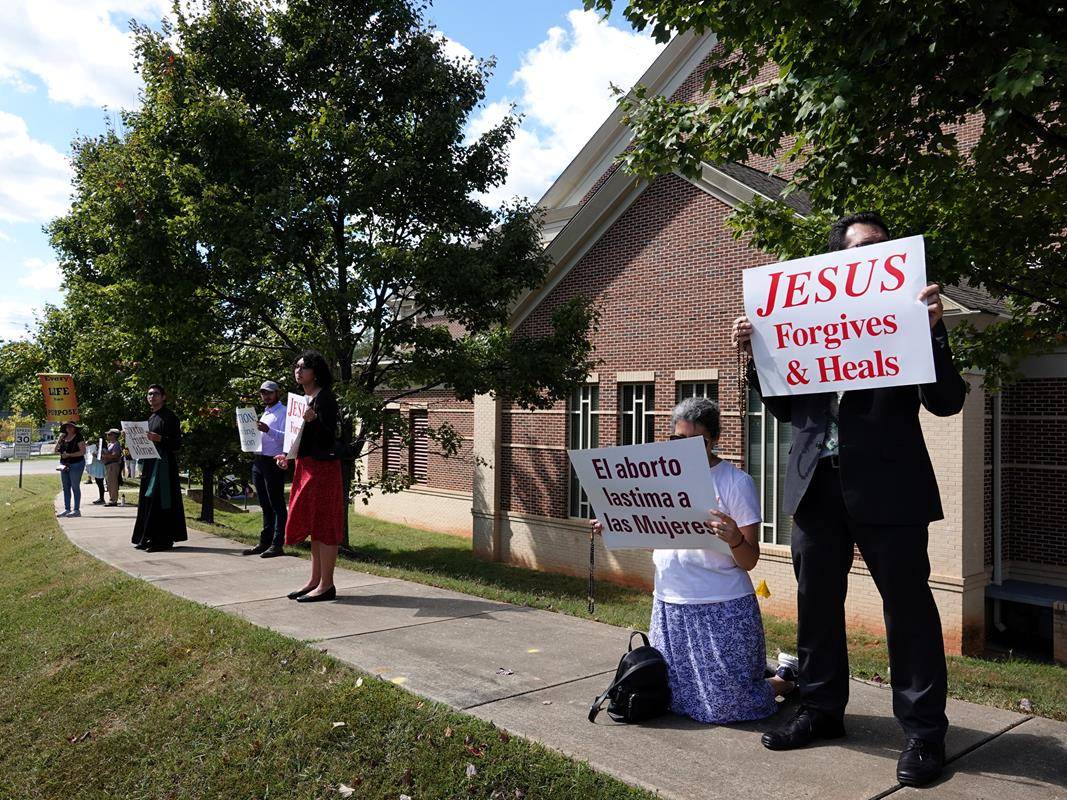 Around 175 people gathered outside St. Mark Church in Huntersville on Oct. 1, to join in the annual Life Chain. (Photos by Amy Burger)