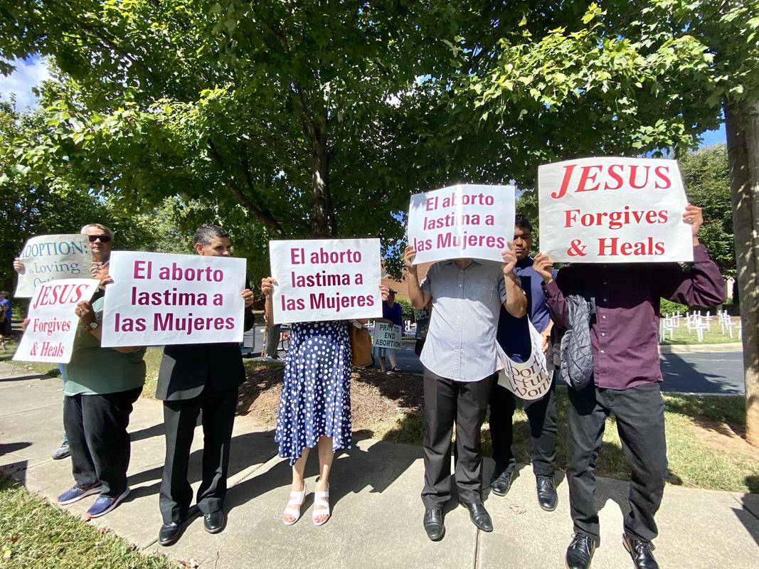 Around 175 people gathered outside St. Mark Church in Huntersville on Oct. 1, to join in the annual Life Chain. (Photos by Amy Burger)