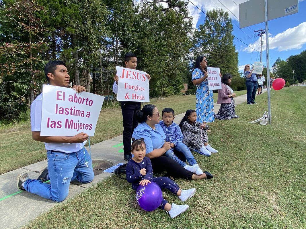 Around 175 people gathered outside St. Mark Church in Huntersville on Oct. 1, to join in the annual Life Chain. (Photos by Amy Burger)