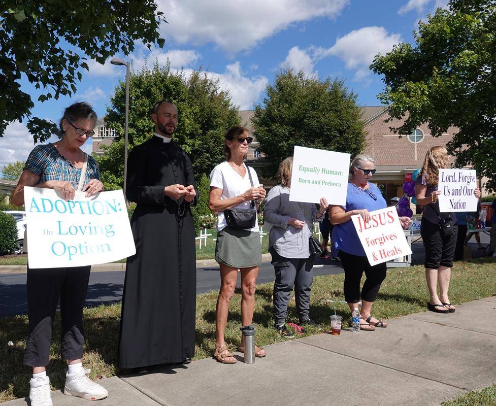 Around 175 people gathered outside St. Mark Church in Huntersville on Oct. 1, to join in the annual Life Chain. (Photos by Amy Burger)