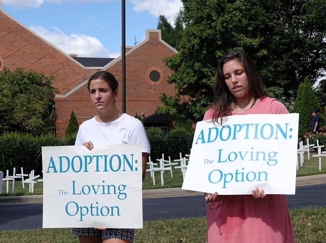 Around 175 people gathered outside St. Mark Church in Huntersville on Oct. 1, to join in the annual Life Chain. (Photos by Amy Burger)