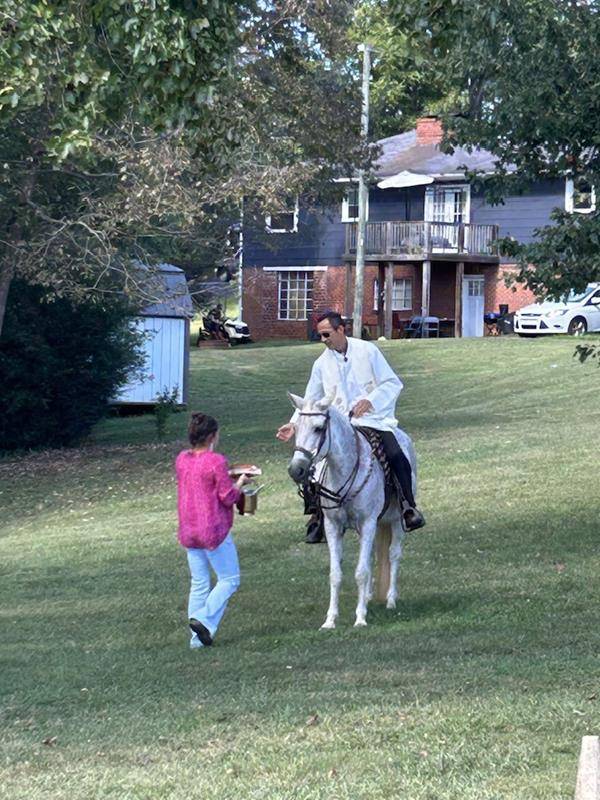 Father Jose Camilo blessing the animals at Holy Trinity Church in Taylorsville on horseback on Sunday, Oct. 1. (Provided photos)