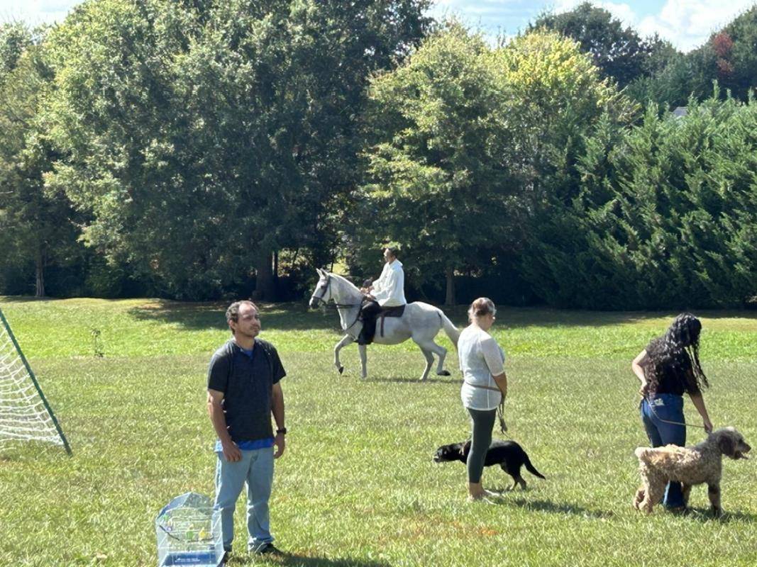 Father Jose Camilo blessing the animals at Holy Trinity Church in Taylorsville on horseback on Sunday, Oct. 1. (Provided photos)