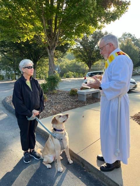 St. Eugene held a pet blessing outside its church in Asheville.
