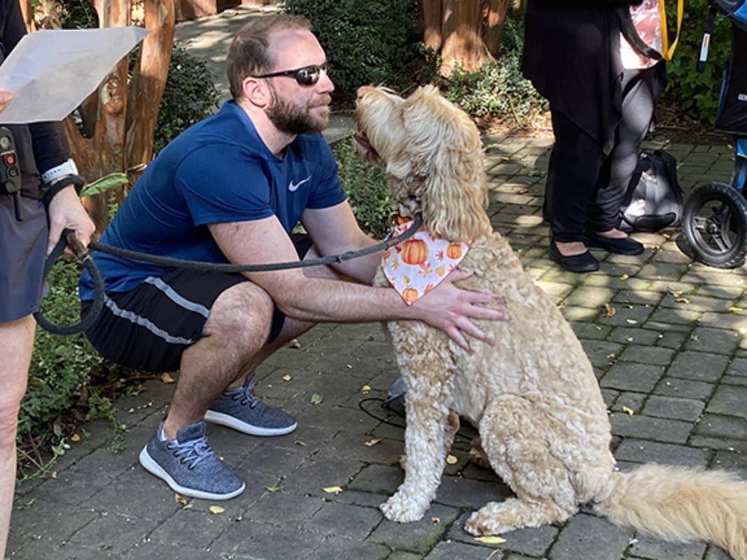 A dozen pets (plus one in spirit) gathered in the garden of St. Peter Church in uptown Charlotte for the annual Blessing of the Animals Sept. 30.