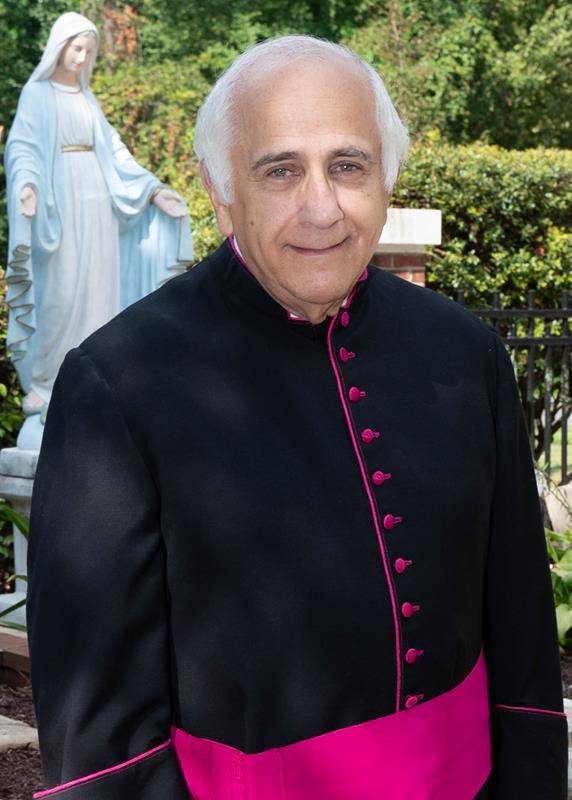 Msgr. Bellow pictured in August 2023