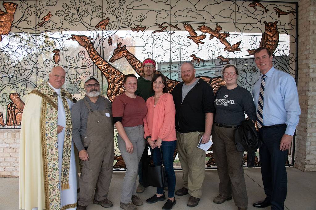Monsignor Anthony Marcaccio and Joe Brady with Jim Gallucci and his team of artists