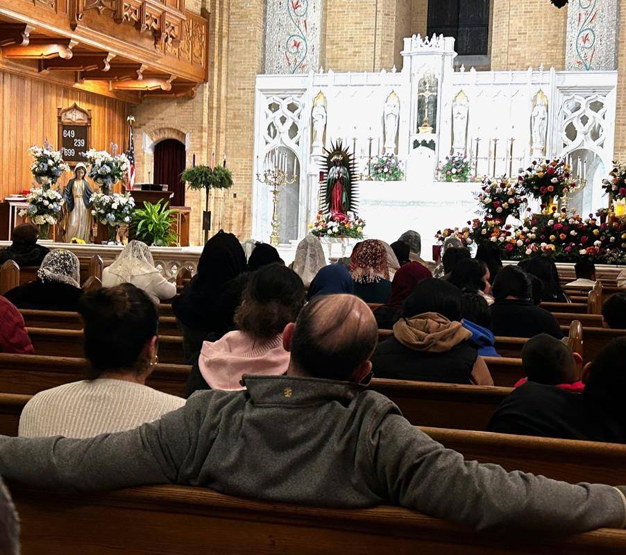 Our Lady of Grace Church in Greensboro held a procession and Mass followed by mariachi music, Mexican hot chocolate and pastries in the courtyard.