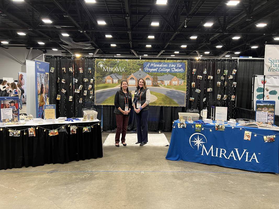 Debbie Capen and her MiraVia team set up an information booth at the conference.