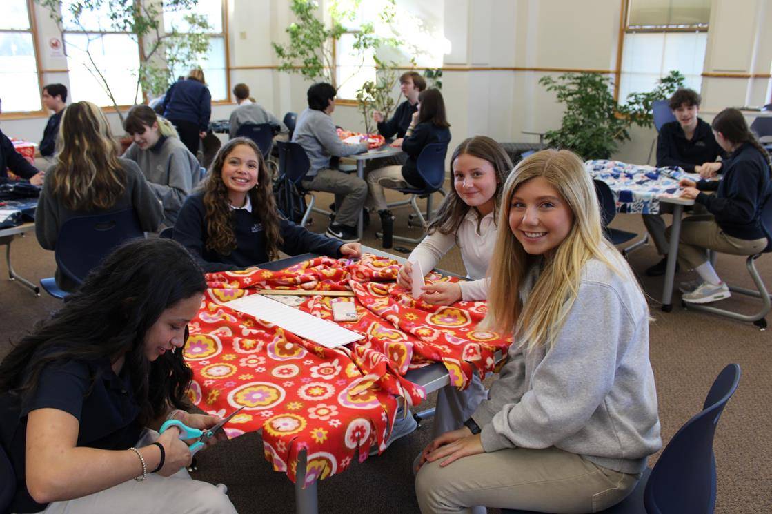 Bishop McGuinness students made blankets for those in need. 