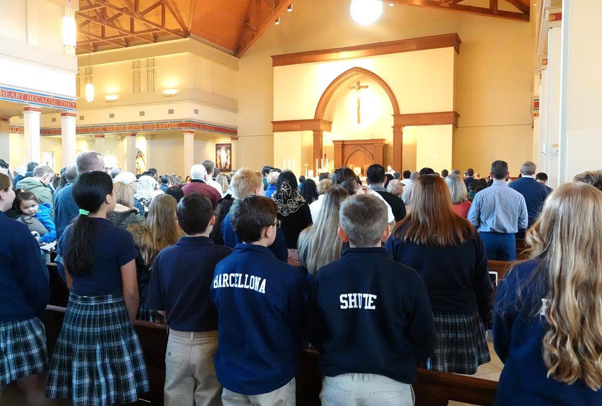 St. Mark Church opened the week with a school Mass. The music was by the school choir, and students from St. Mark Catholic School served as ushers, lectors and altar servers. 