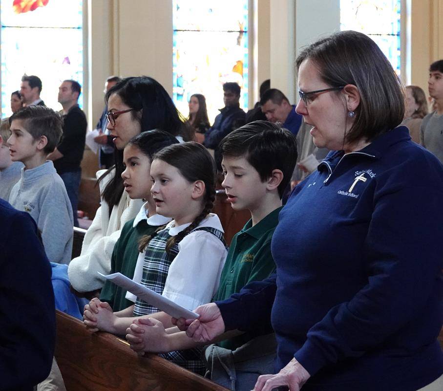 St. Mark Church opened the week with a school Mass. The music was by the school choir, and students from St. Mark Catholic School served as ushers, lectors and altar servers. 