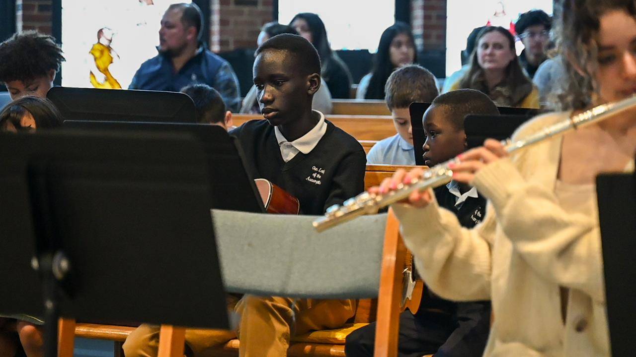 The school’s band accompanied the parish’s choir and provide music throughout the liturgy. 