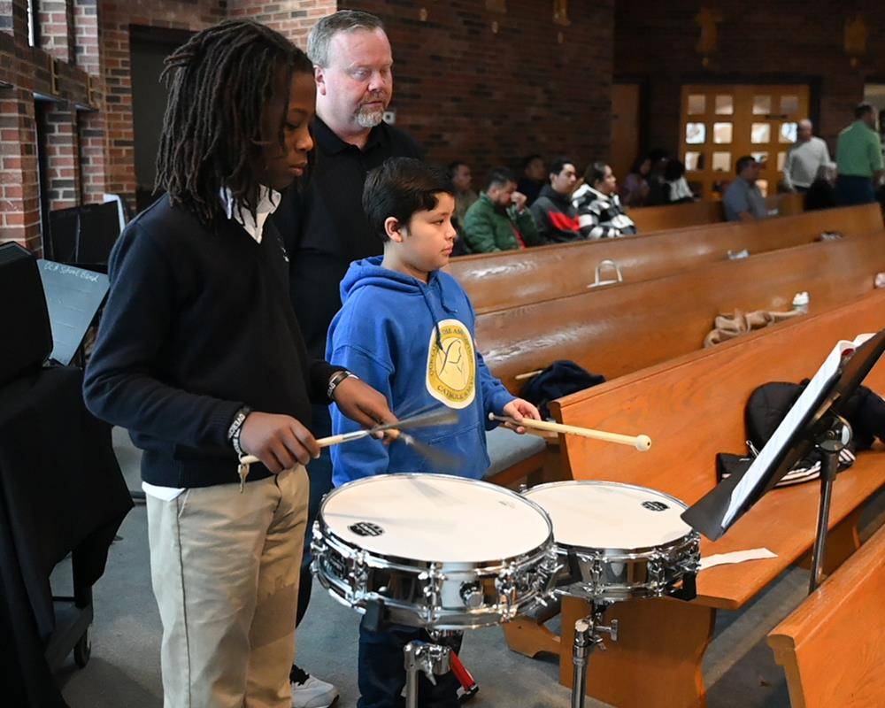 The school’s band accompanied the parish’s choir and provide music throughout the liturgy. 