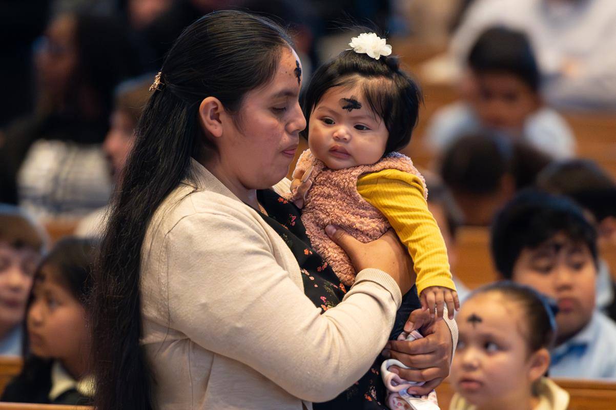 Father Victor Ameh, a priest of the Missionary Society of St. Paul of Nigeria, newly assigned to Our Lady of the Assumption in Charlotte celebrated Ash Wednesday Mass with students from Our Lady of the Assumption School. 