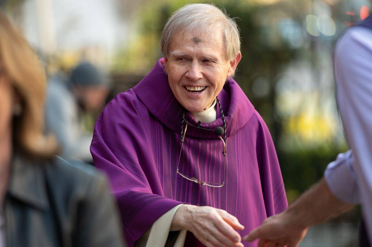 Faithful attend the 7:30 a.m. Ash Wednesday Mass at St. Peter Church in Charlotte. 