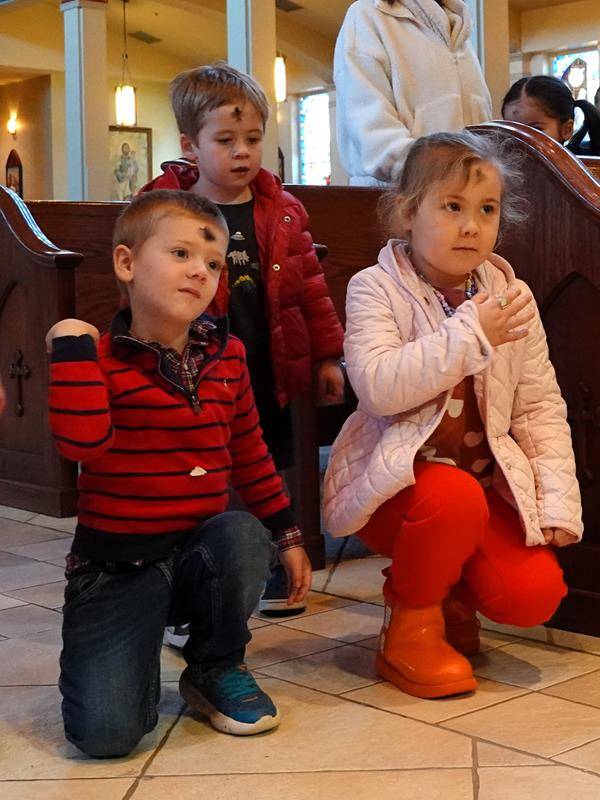 Father John Putnam and Deacon Tom McGahey held a special Liturgy of the Word and Ashes service for St. Mark School’s preschool students. 
