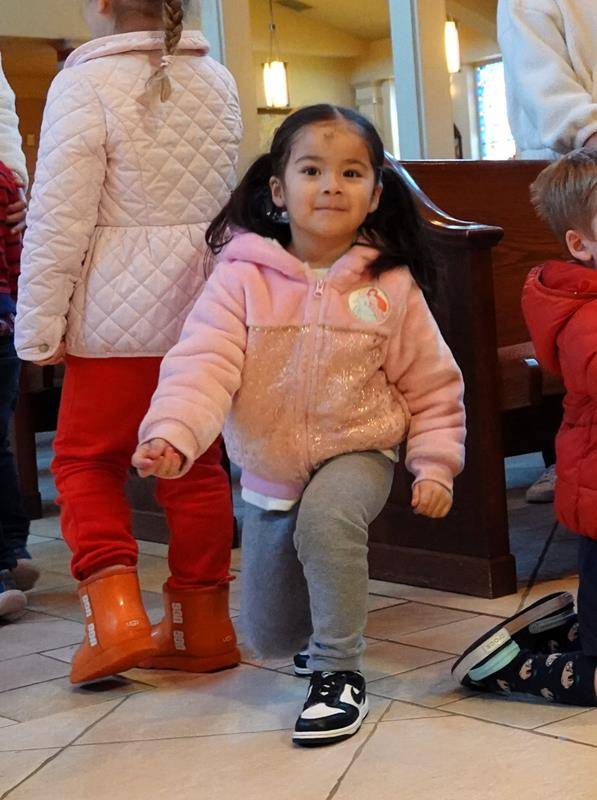 Father John Putnam and Deacon Tom McGahey held a special Liturgy of the Word and Ashes service for St. Mark School’s preschool students. 