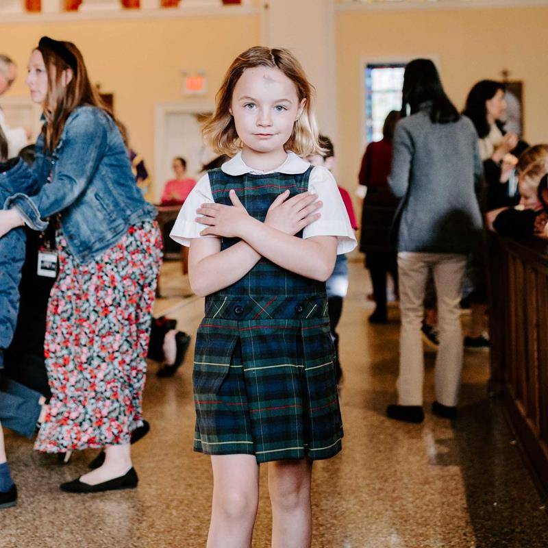 Father Timothy Reid celebrated Ash Wednesday Mass for St. Ann School students at St. Ann Church in Charlotte.