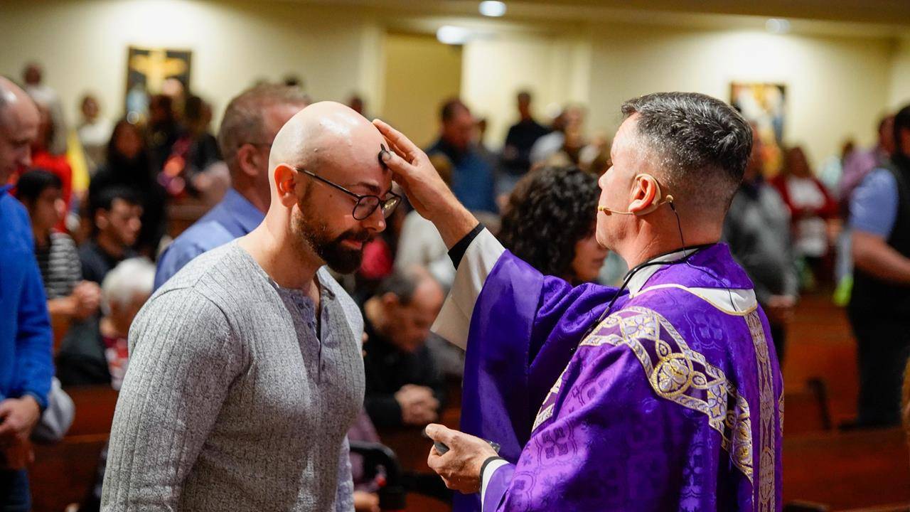 Father Richard Sutter celebrated Ash Wednesday Mass at St. Gabriel Church in Charlotte.