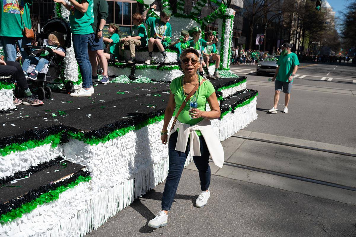 Students, staff and family of St. Patrick school march in the parade.