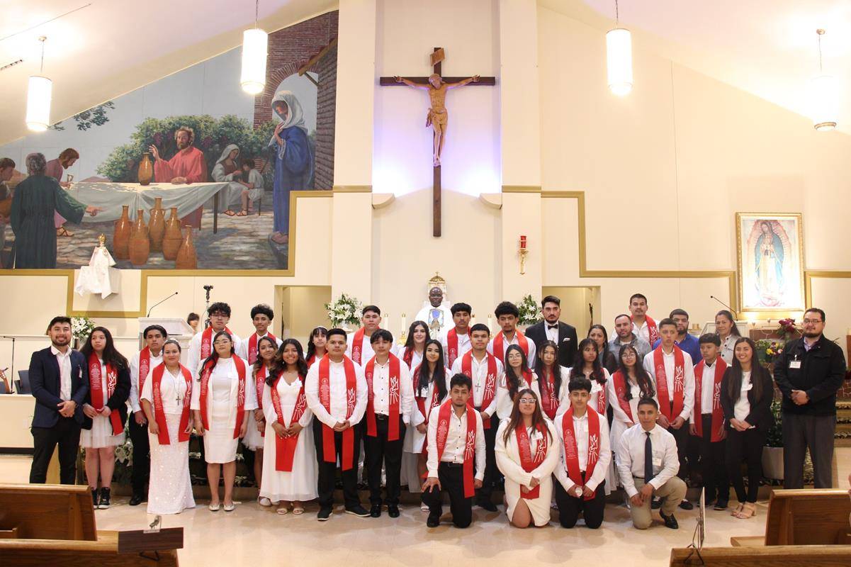 Those who recieved sacraments at Divine Redeemer Church in Boonville.
