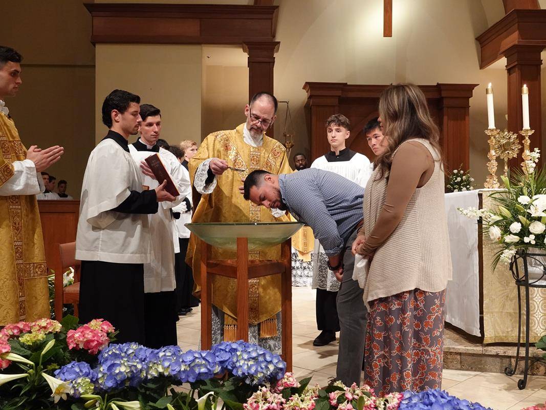 Easter Vigil at St. Mark Church in Huntersville.