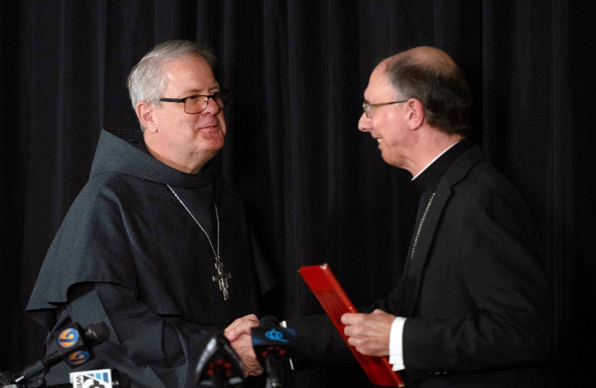 Bishop-Elect Michael Martin, OFM Conv., is welcomed to the Diocese of Charlotte April 9 by Bishop Peter Jugis, who announced his retirement today due to health reasons. Bishop-Elect Martin will become the fifth Bishop of Charlotte in May.