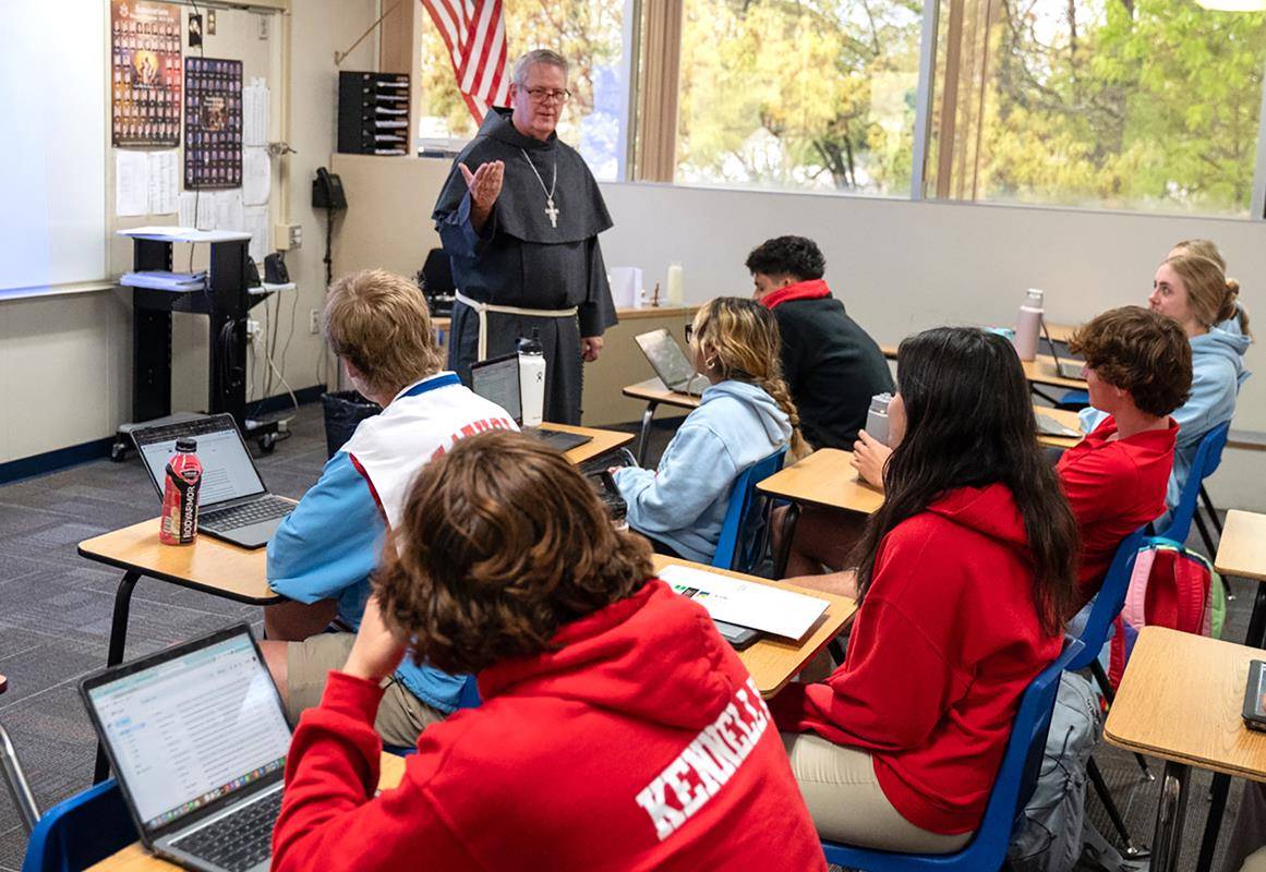 Bishop-Elect Michael Martin, OFM Conv., speaks to students in a theology class at Charlotte Catholic High School April 9, during his first day visiting the Diocese of Charlotte following the announcement that he will become the fifth Bishop of Charlotte.