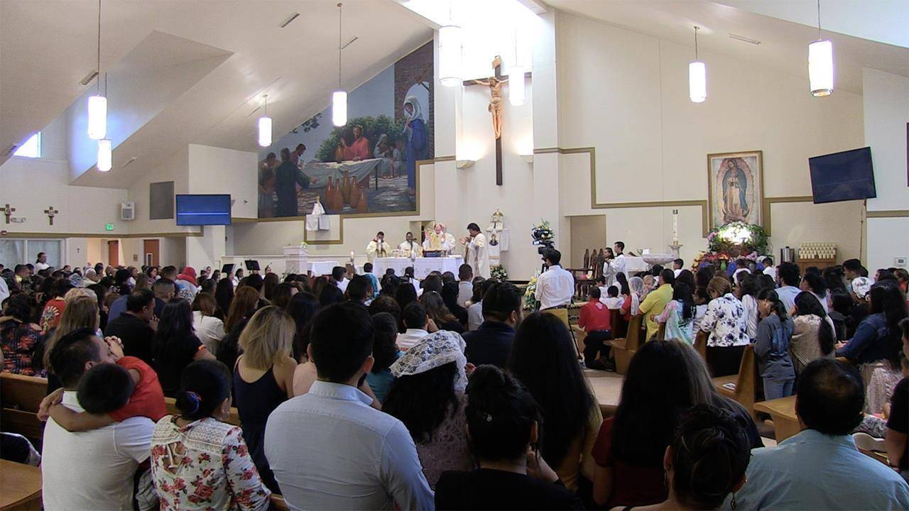 Members of Divine Redeemer Parish celebrated the 15th anniversary of the dedication of their church in 2019 with the bishop who originally consecrated it: Bishop Peter Jugis