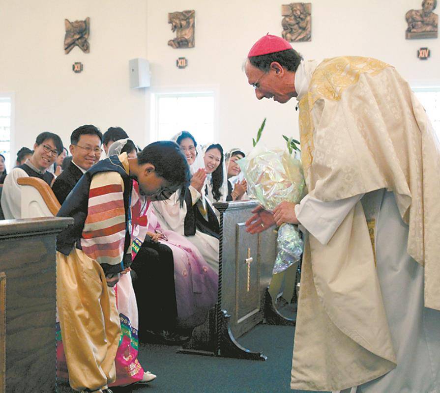 Celebrating Mass with the Korean community in Greensboro.