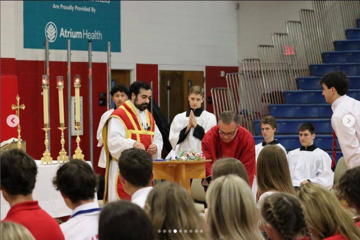 After Charlotte Catholic High School’s last all-school Mass of the school year, the seniors gathered to celebrate the annual tradition of May Crowning.
