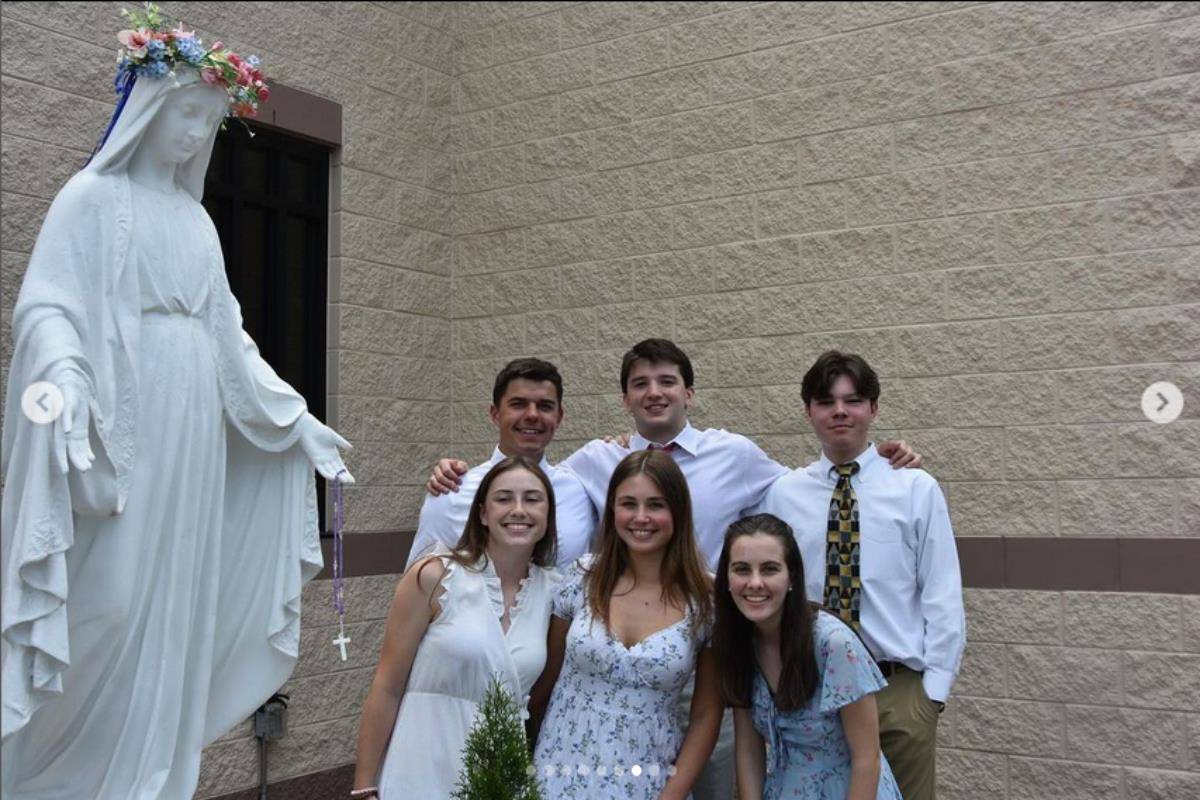 After Charlotte Catholic High School’s last all-school Mass of the school year, the seniors gathered to celebrate the annual tradition of May Crowning.