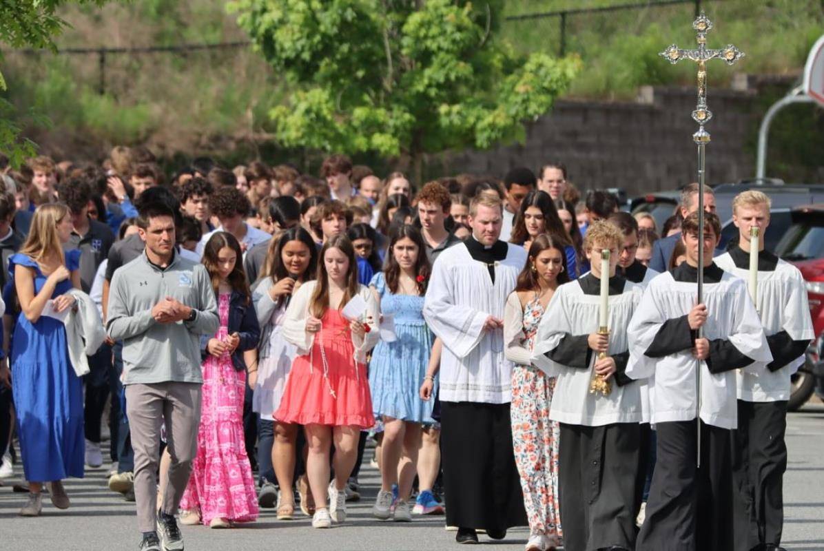 The Christ the King School community celebrated May Crowning with a rosary procession around school. 