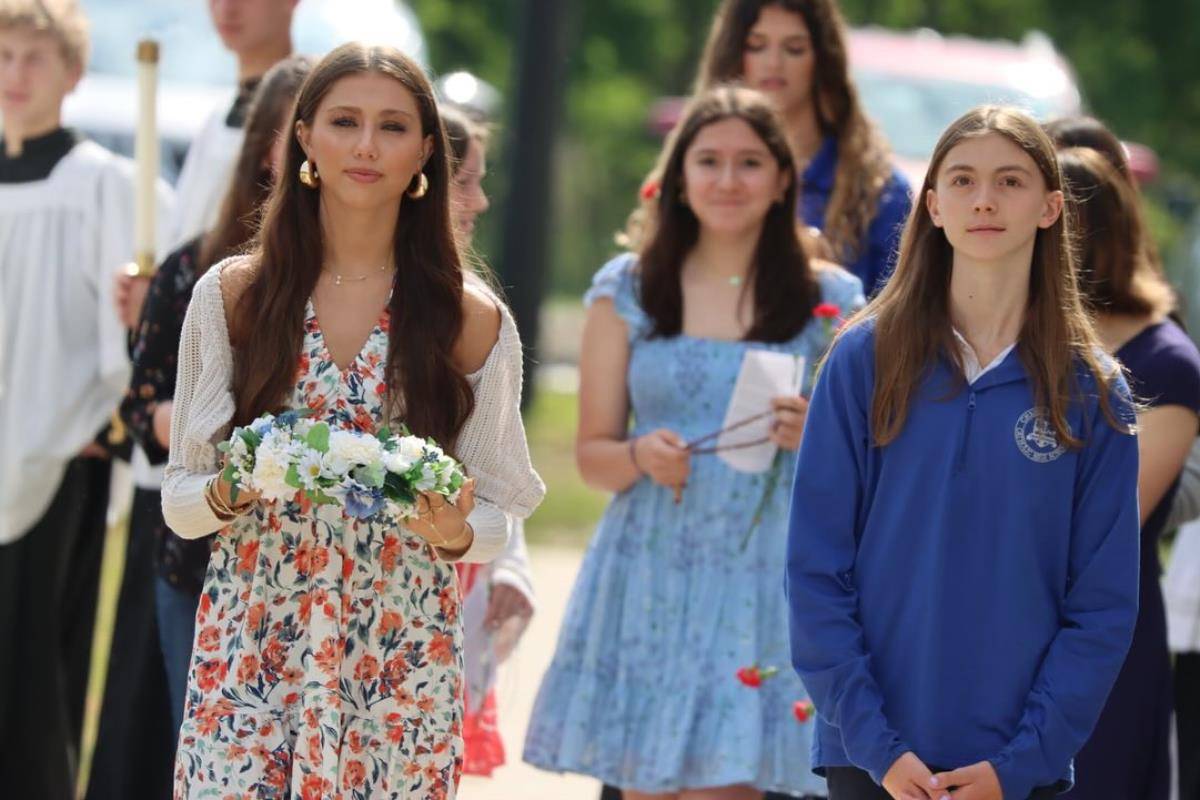 The Christ the King School community celebrated May Crowning with a rosary procession around school. 