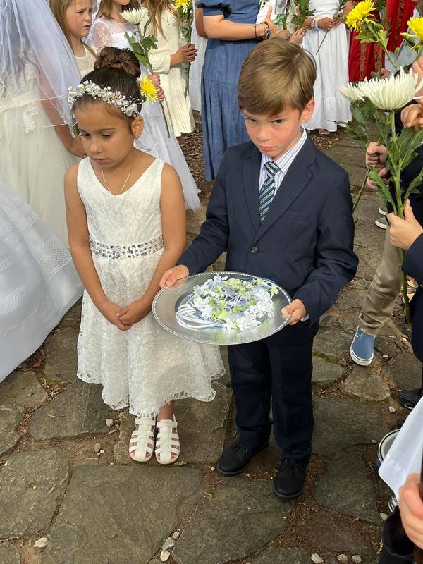 Father Ernest led the students, and the rest of the St. Patrick Catholic School family, in blessing the crown and placing it atop the school's statue of Mary.